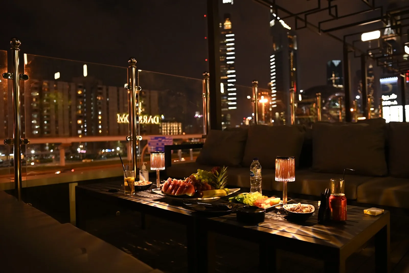Outdoor terrace seating with views of the Sheikh Zayed Road towers